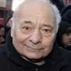 Burt Young as Lou