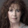 Bríd Ní Neachtain as Mrs. O'Riordan