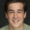 Owen Judge as Young Reed