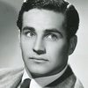 George Holmes as Roy Collins aka Roy Anderson