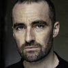 Russ Bain as Darius