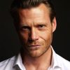 Adam Dorsey as Sam Paxton