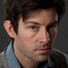 Shane Carruth as Aaron