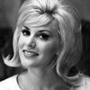 June Wilkinson as Shirley (Uncredited)