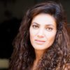 Atika Taoualit as Malika