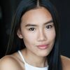 Claudia Kai as Liz
