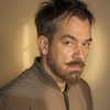 Travis Lee Eller as Professor Cooper