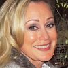 Sandra Wilder as Blonde Photographer