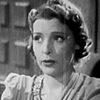 Florence Wright as Blonde Secretary