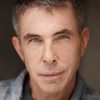 Andrew McIlroy as John Wilson