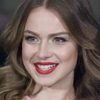 Carla Nieto as María