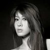 Melody Low as Xuan