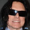 Tommy Wiseau as Harvey Lewis