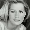 Rowanne Brewer as April