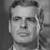 John McNamara as Mr. Khortney