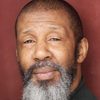 Brian Bovell as Social Services Officer