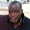 Lamine Dieng as Kostas