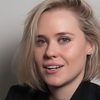 Georgia Mischak as Woman on Plane