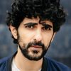 Reza Brojerdi as Malik
