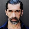 Erdal Yıldız as Hotel Employee