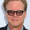 Bruce Timm as Booster Gold (voice)