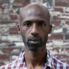 Youssef Diawara as Hog-Tied Prisoner
