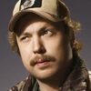 Travis Nicholson as Travis