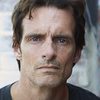 Scott McCord as Manfred