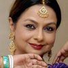 Neelima Azim as Mummy