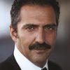 Yavuz Bingol as Suleyman (Saler of Doner)