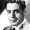 George Givot as Police Lt. Rues
