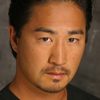 Michael Li as Action Team