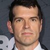 Timothy Simons as Father Murphy