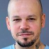 Residente as Tattoo Artist