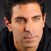 Tarek Bishara as Hasan
