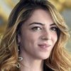 Giulia Andò as Paola