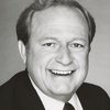 Richard McKenzie as John Behan