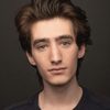 Theo Taplitz as Justin