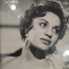 Renee Renor as Cuban Singer