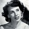 Clara Auteri Pepe as Woman saying 'Viva Peppone!'