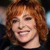 Mylène Farmer as Woman lying on the bed