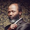 Mike Mvelase as Pastor Solomon