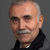 Necmettin Çobanoglu as Ev Sahibi