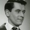 Jacques Famery as Bank Clerk