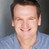 Dean England as Price Mathews-TV News Anchor