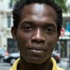 Eric Abrogoua as Rigobert 'Fisherman'