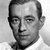 Alec Guinness as John Barratt / Jacques De Gue