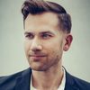 Aaron Moorhead as Less Handsome Officer