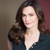 Deborah Zoe as Adrienne Green