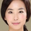 Jang Yun-sil as Reporter Kim